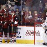 Arizona Coyotes defenseman Oliver Ekman-Larsson (23) celebrates his goal against Buffalo Sabres goalie Robin Lehner (40) with Coyotes left wing Max Domi, second from left, and right wing Christian Fischer (36) during the first period of an NHL hockey game Thursday, Nov. 2, 2017, in Glendale, Ariz. (AP Photo/Ross D. Franklin)