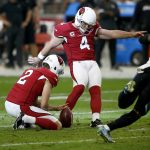 Arizona Cardinals kicker Phil Dawson (4) kicks a field goal against the Jacksonville Jaguars as punter Andy Lee (2) holds during the first half of an NFL football game, Sunday, Nov. 26, 2017, in Glendale, Ariz. (AP Photo/Ross D. Franklin)