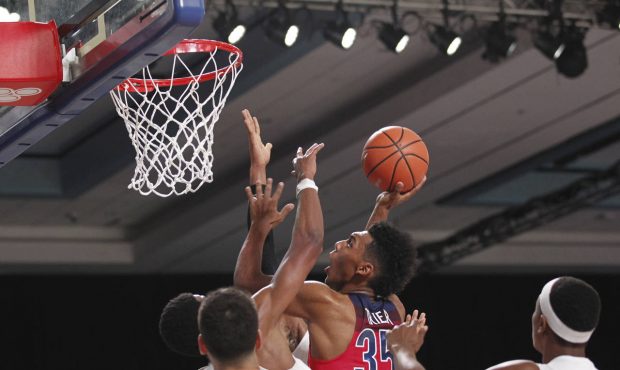 Arizona guard Allonzo Trier (35) drives to the basket against SMU during an NCAA college basketball...