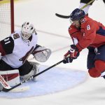 Washington Capitals left wing Alex Ovechkin (8), of Russia, tries to get the puck past Arizona Coyotes goalie Scott Wedgewood (31) during the third period of an NHL hockey game, Monday, Nov. 6, 2017, in Washington. The Capitals won 3-2 in overtime. (AP Photo/Nick Wass)