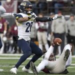 Northern Arizona safety Wes Sutton (28) signals "no catch" after breaking up a pass intended for Montana wide receiver Samori Toure in an NCAA college football game Saturday, Nov. 4, 2017, in Missoula, Mont. (AP Photo/Patrick Record)
