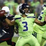 Seattle Seahawks quarterback Russell Wilson (3) throws against the Arizona Cardinals prior to an NFL football game, Thursday, Nov. 9, 2017, in Glendale, Ariz. (AP Photo/Ross D. Franklin)