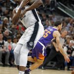 San Antonio Spurs Rudy Gay grimaces after a play against the Phoenix Suns in a NBA game on Sunday, Nov. 5, 2017 in San Antonio. (AP Photo/Ronald Cortes)