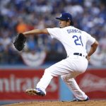 Los Angeles Dodgers starting pitcher Yu Darvish throws during the first inning of Game 7 of baseball's World Series against the Houston Astros Wednesday, Nov. 1, 2017, in Los Angeles. (AP Photo/Tim Bradbury, Pool)