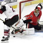Ottawa Senators goaltender Mike Condon (1) makes a save on a breakaway attempt by Arizona Coyotes' Derek Stepan (21)  during the second period of an NHL hockey game in Ottawa, Saturday, Nov. 18, 2017. (Justin Tang/The Canadian Press via AP)