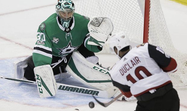 Dallas Stars goalie Ben Bishop (30) defends the goal against Arizona Coyotes left wing Anthony Ducl...