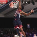 In this photo provided by Bahamas Visual Services, Arizona guard Allonzo Trier (35) slam-dunks against Purdue during an NCAA college basketball game Friday, Nov. 24, 2017, at the Battle 4 Atlantis tournament in Paradise Island, Bahamas. (Tim Aylen/Bahamas Visual Services Photo via AP)