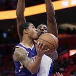 Phoenix Suns guard Tyler Ulis (8) goes to the basket against Detroit Pistons center Andre Drummond (0) during the first half of an NBA basketball game Wednesday, Nov. 29, 2017 in Detroit. (AP Photo/Duane Burleson)