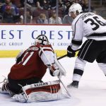Arizona Coyotes goalie Scott Wedgewood, left, makes a save on a shot by Los Angeles Kings left wing Jussi Jokinen (36) during the first period of an NHL hockey game Friday, Nov. 24, 2017, in Glendale, Ariz. (AP Photo/Ross D. Franklin)