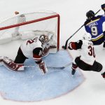 St. Louis Blues' Scottie Upshall (9) is unable to score past Arizona Coyotes goalie Antti Raanta, of Finland, and Coyotes' Christian Fischer (36) during the second period of an NHL hockey game Thursday, Nov. 9, 2017, in St. Louis. (AP Photo/Jeff Roberson)