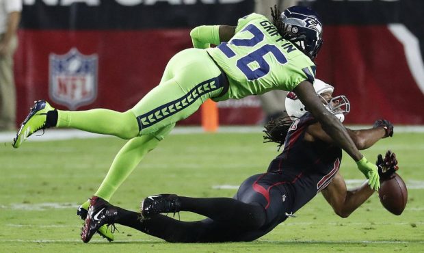 Seattle Seahawks cornerback Shaquill Griffin (26) breaks up a pass intended for Arizona Cardinals w...