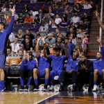 The Orlando Magic bench cheers during the second half of an NBA basketball game against the Phoenix Suns, Friday, Nov. 10, 2017, in Phoenix. (AP Photo/Matt York)