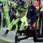 Seattle Seahawks wide receiver Doug Baldwin (89) is knocked out of bounds by Arizona Cardinals outside linebacker Chandler Jones (55) during the first half of an NFL football game, Thursday, Nov. 9, 2017, in Glendale, Ariz. (AP Photo/Rick Scuteri)