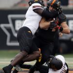 Oregon State running back Ryan Nall, center, tries to get past a pair of Arizona State defenders in the second half of an NCAA college football game in Corvallis, Ore., Saturday, Nov. 18, 2017. (AP Photo/Timothy J. Gonzalez)