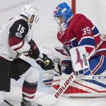 Arizona Coyotes' Brad Richardson, left, moves in against Montreal Ganadiens goaltender Charlie Lindgren during first-period NHL hockey game action in Montreal, Thursday, Nov. 16, 2017. (Graham Hughes/The Canadian Press via AP)