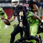 Arizona Cardinals quarterback Drew Stanton (5) scrambles against the Seattle Seahawks during the first half of an NFL football game, Thursday, Nov. 9, 2017, in Glendale, Ariz. (AP Photo/Ross D. Franklin)
