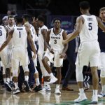 Xavier players celebrate after a play against Arizona State during the first half of an NCAA college basketball game Friday, Nov. 24, 2017, in Las Vegas. (AP Photo/John Locher)