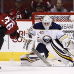 Arizona Coyotes right wing Christian Fischer (36) has his shot blocked by Buffalo Sabres goalie Robin Lehner (40) during the first period of an NHL hockey game Thursday, Nov. 2, 2017, in Glendale, Ariz. (AP Photo/Ross D. Franklin)