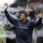 Former Houston Texans receiver Andre Johnson, who is being inducted into the Texans Ring of Honor, runs on to the field before an NFL football game between the Houston Texans and the Arizona Cardinals, Sunday, Nov. 19, 2017, in Houston. (AP Photo/David J. Phillip)