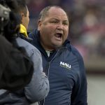 Northern Arizona head coach Jerome Souers reacts to a penalty called against his team while playing Montana in an NCAA college football game Saturday, Nov. 4, 2017, in Missoula, Mont. (AP Photo/Patrick Record)