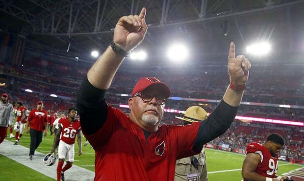 Arizona Cardinals head coach Bruce Arians leaves the field after an NFL football game against the J...