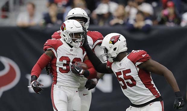 Arizona Cardinals safety Budda Baker celebrates a fumble recovery during the first half of an NFL f...
