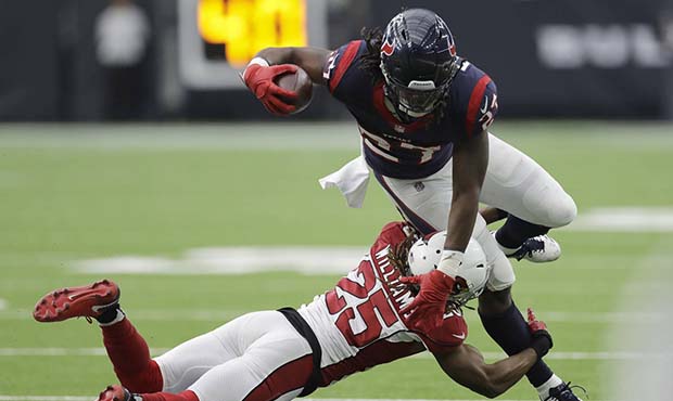 Houston Texans running back D'Onta Foreman (27) is upended by Arizona Cardinals defensive back Tram...