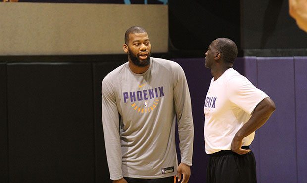Phoenix Suns center Greg Monroe (left) arrived to Talking Stick Resort Arena in Phoenix for the fir...