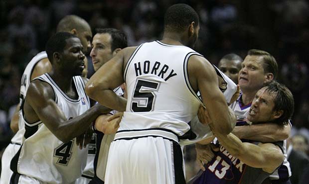 Phoenix Suns guard Steve Nash, right, of Canada, goes after San Antonio Spurs forward Robert Horry ...