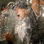 Arizona Diamondbacks manager Torey Lovullo is sprayed by his team after the National League wild-card playoff baseball game against the Colorado Rockies, Wednesday, Oct. 4, 2017, in Phoenix. The Diamondbacks won 11-8 to advance to an NLDS against the Los Angeles Dodgers. (AP Photo/Ross D. Franklin)