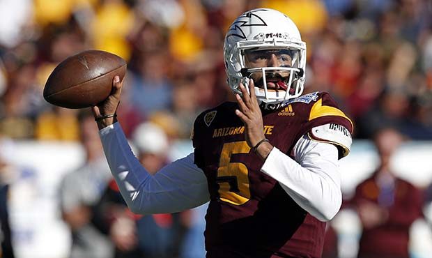 Arizona State quarterback Manny Wilkins throws against North Carolina State during the first half o...