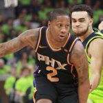 Phoenix Suns guard Isaiah Canaan (2) drives against Minnesota Timberwolves guard Tyus Jones (1) in the first quarter of an NBA basketball game on Saturday, Dec. 16, 2017, in Minneapolis. (AP Photo/Andy Clayton-King)