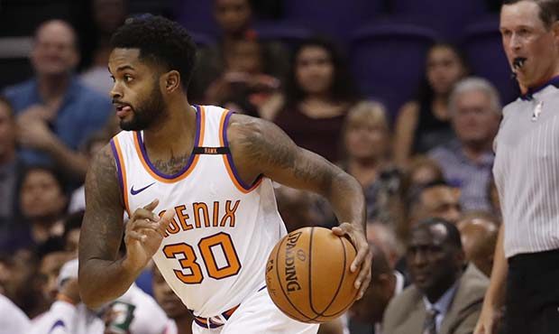 Phoenix Suns guard Troy Daniels (30) drives against the Orlando Magic during the first half of an N...