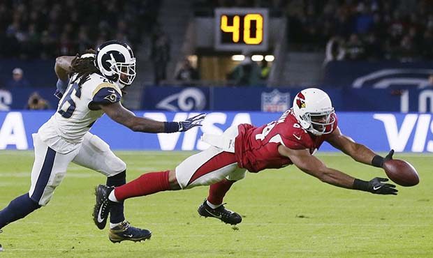 Arizona Cardinals tight end Jermaine Gresham (84) reaches to catch the ball as Los Angeles Rams ins...