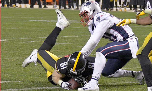 Pittsburgh Steelers tight end Jesse James (81) catches a pass then twists to stretch the ball into ...