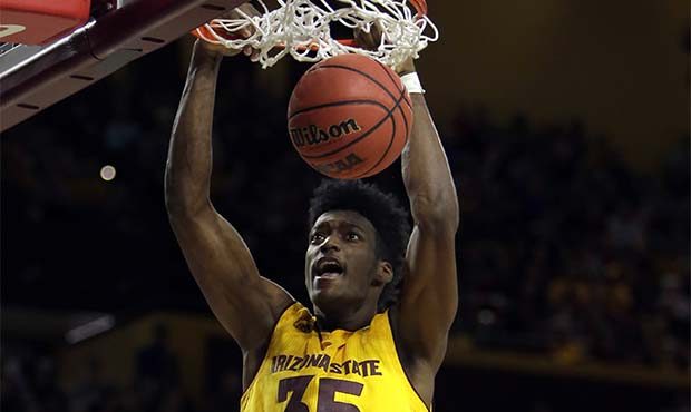Arizona State forward De'Quon Lake (35) dunks in front of Pacific forward Jack Williams in the seco...