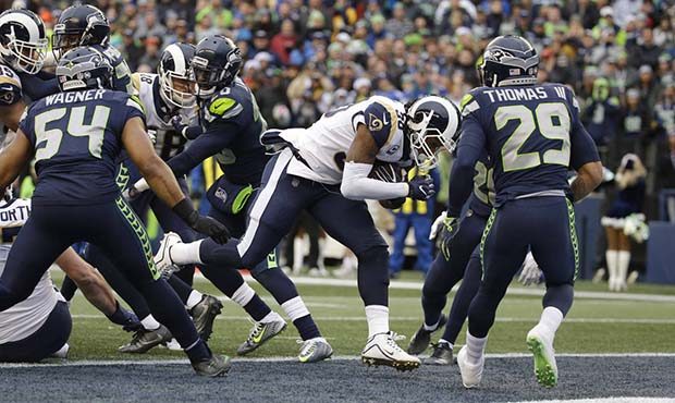 Los Angeles Rams running back Todd Gurley, second from right, rushes for a touchdown as Seattle Sea...
