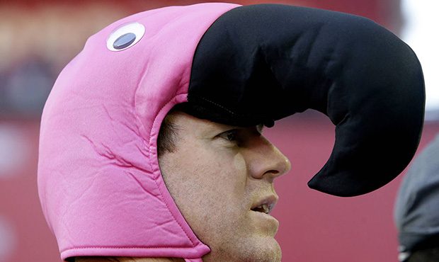 Arizona Cardinals quarterback Carson Palmer wears a pink flamingo suit after losing the weekly quar...