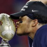 Penn State safety Marcus Allen kisses the trophy after Penn State defeated Washington 35-28 in the Fiesta Bowl NCAA college football game Saturday, Dec. 30, 2017, in Glendale, Ariz. (AP Photo/Rick Scuteri)