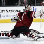 Arizona Coyotes goalie Scott Wedgewood watches the puck after deflecting it during the second period of an NHL hockey game against the Vegas Golden Knights, Sunday, Dec. 3, 2017, in Las Vegas. (AP Photo/David Becker)