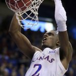 Kansas guard Lagerald Vick (2) dunks during the first half of an NCAA college basketball game against Arizona State in Lawrence, Kan., Sunday, Dec. 10, 2017. (AP Photo/Orlin Wagner)