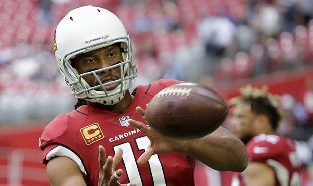 Arizona Cardinals wide receiver Larry Fitzgerald warms up prior to an NFL football game against the...