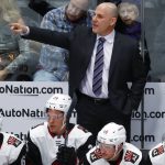 Arizona Coyotes head coach Rick Tocchet directs his team against the Colorado Avalanche in the first period of an NHL hockey game Wednesday, Dec. 27, 2017, in Denver. (AP Photo/David Zalubowski)