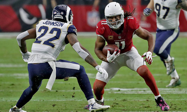 Arizona Cardinals wide receiver Larry Fitzgerald (11) tries to elude Los Angeles Rams cornerback Tr...