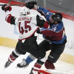 Colorado Avalanche defenseman Mark Barberio, right, collides with Arizona Coyotes right wing Josh Archibald during the third period of an NHL hockey game Wednesday, Dec. 27, 2017, in Denver. The Coyotes won 3-1. (AP Photo/David Zalubowski)
