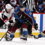 Colorado Avalanche center Carl Soderberg (34), of Sweden, reaches out to control the puck as Arizona Coyotes defenseman Luke Schenn covers in the second period of an NHL hockey game Wednesday, Dec. 27, 2017, in Denver. (AP Photo/David Zalubowski)