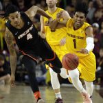 Arizona State guard Remy Martin (1) shields the ball away from Pacific guard Roberto Gallinat in the second half during an NCAA college basketball game, Friday, Dec 22, 2017, in Tempe, Ariz. (AP Photo/Rick Scuteri)
