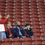 Fans watch the first half of the Foster Farms Bowl NCAA college football game between Arizona and Purdue, Wednesday, Dec. 27, 2017, in Santa Clara, Calif. (AP Photo/Marcio Jose Sanchez)