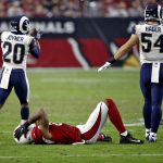 Arizona Cardinals tight end Jermaine Gresham reacts to missing a catch as Los Angeles Rams free safety Lamarcus Joyner (20) and inside linebacker Bryce Hager (54) walk away during the second half of an NFL football game, Sunday, Dec. 3, 2017, in Glendale, Ariz. (AP Photo/Ross D. Franklin)