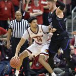 Louisville forward Anas Mahmoud (14) attempts to work his way into the lane through the defense of Grand Canyon forward Alessandro Lever (25) during the first half of an NCAA college basketball game, Saturday, Dec. 23, 2017, in Louisville, Ky. (AP Photo/Timothy D. Easley)